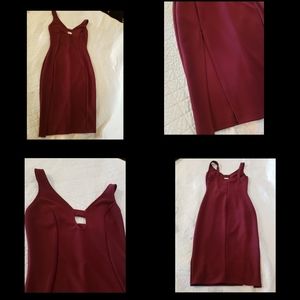 Knee high burgundy dress.